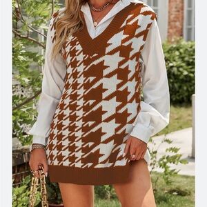 Sweater dress vest. Never worn. Size small.
